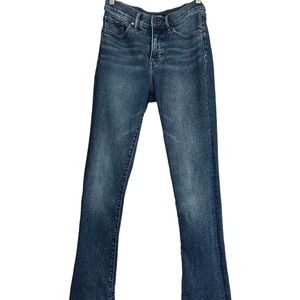 Very rarely worn jean with a small opening for boots